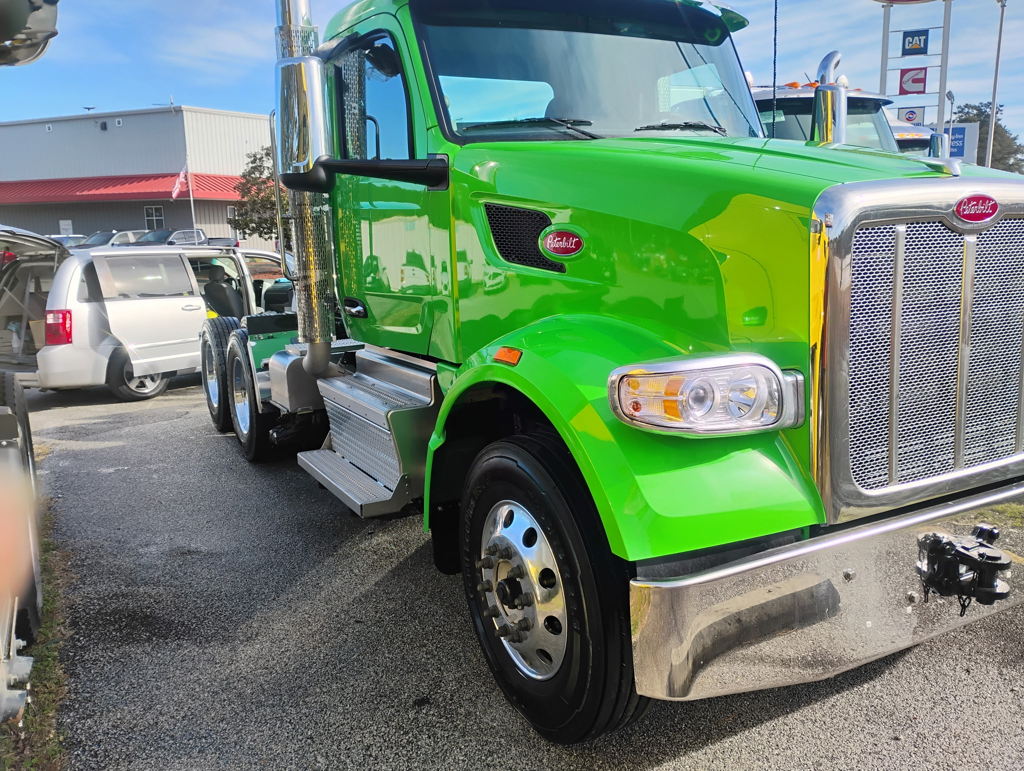 Green semi tractor washed and gleaming